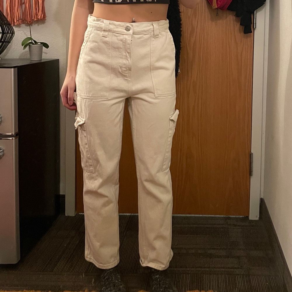 White PacSun cargo pants with pockets on side